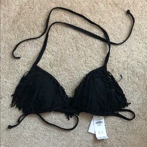 Frilly black bathing suit top